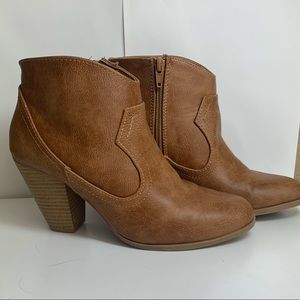 Brown heeled boots open to offers